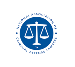 A blue and white logo of the national association for criminal defense lawyers.